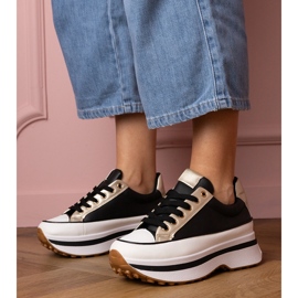 Zapatillas de deporte de zapatillas negras en platfotm negro 1