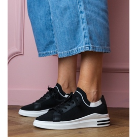 Zapatillas negras para mujeres en la plataforma con cordones negro 1