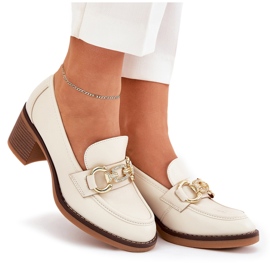 Zapatos de mujer con un detalle dorado con tacones beige 8