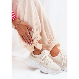Zapatillas deportivas para mujeres con zapatillas en una suela beige gruesa 7