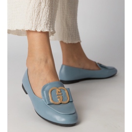 Mocasines de mujer azul con una decoración dorada 4