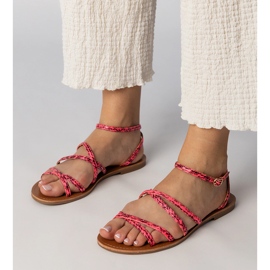 Sandalias rosadas en una suela plana rosado 2
