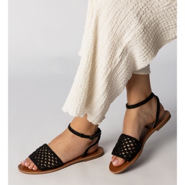 Sandalias negras tejidas en una suela plana negro 1 Sandalias negras tejidas en una suela plana negro 1