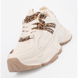 Zapatillas de deporte para mujeres en una suela de leopardo grueso beige 1
