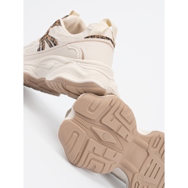 Zapatillas de deporte para mujeres en una suela de leopardo grueso beige 2