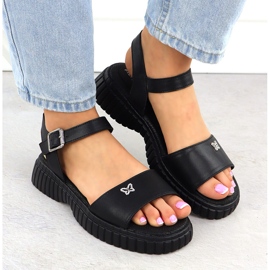 Sandalias de cuero para mujeres en una suela gruesa con un Filippo negro de mariposa DS6811 6