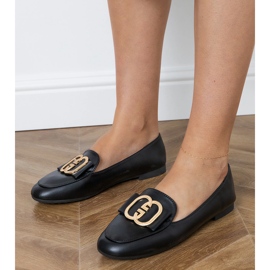 Mocasines de mujeres negras con una decoración dorada negro 1