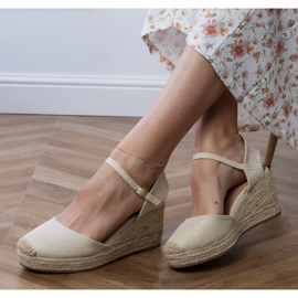 Sandalias beige alpargatas en cuña 2