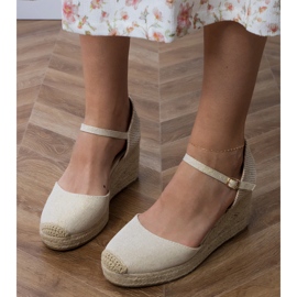 Sandalias beige alpargatas en cuña 4
