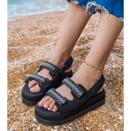 Sandalias negras con rayas bordadas en la plataforma negro 4