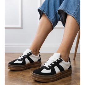 Zapatillas negras de mujer en la plataforma. negro 1 Zapatillas negras de mujer en la plataforma. negro 1