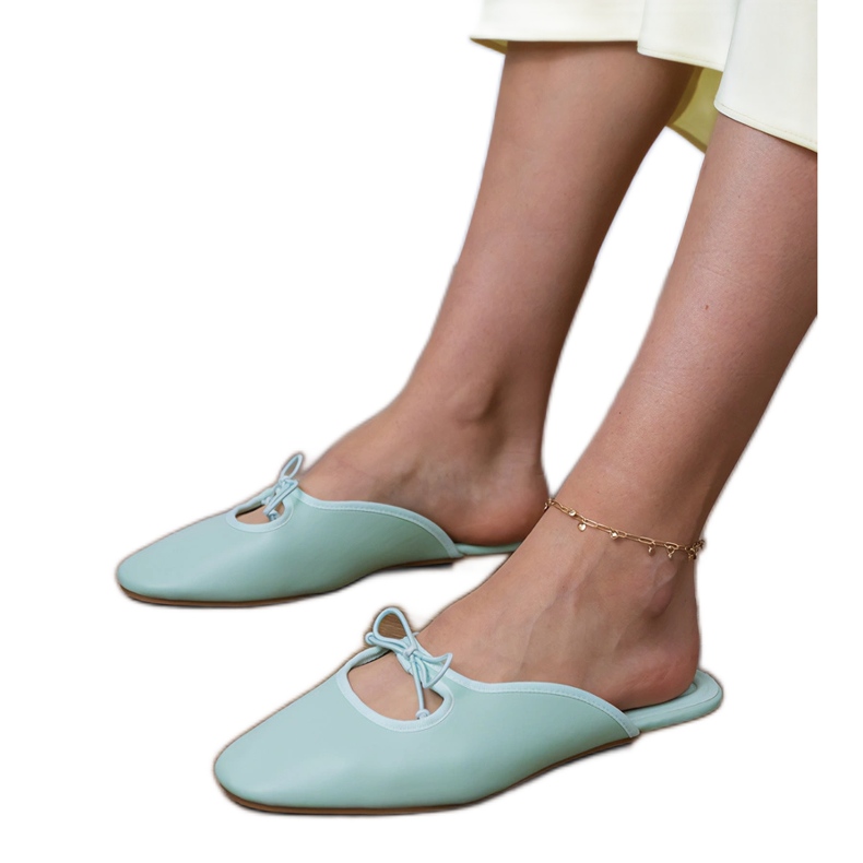 Flip -Flops construidos sobre una suela plana verde 1 Flip -Flops construidos sobre una suela plana verde 1