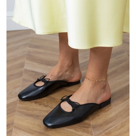 Flip Black -Flops construidos sobre una suela plana negro 2