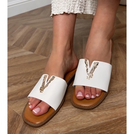 Chanclas blancas con una decoración dorada blanco 1