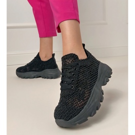 Zapatillas de zapatillas negras abiertas en la plataforma negro 3
