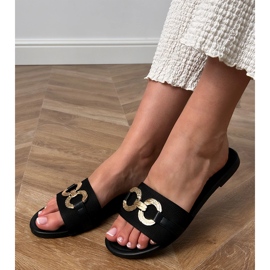 Chanclas negras con una decoración dorada en la barra negro 1 Chanclas negras con una decoración dorada en la barra negro 1