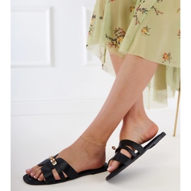 Chanclas negras con recortes en el cinturón y decoración dorada negro 2