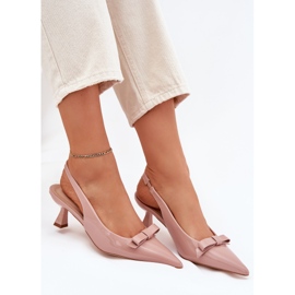 Sandalias barnizadas en un alfiler con un arco desnudo beige 6