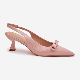 Sandalias barnizadas en un alfiler con un arco desnudo beige 4