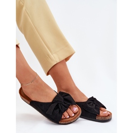 Zapatillas para mujeres en una suela de corcho con un arco negro 6