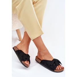 Zapatillas para mujeres en una suela de corcho con un arco negro 7