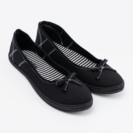 Ballerinas de material negro con arco 4