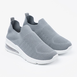 Zapatos deportivos en forma de gris 1