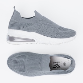 Zapatos deportivos en forma de gris 5