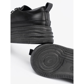 Zapatillas negras en la plataforma negro 1