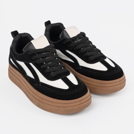 Zapatillas negras para mujeres con inserciones blancas. negro 2