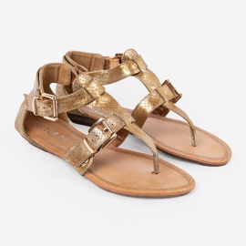 Sandalias doradas al estilo de japonés con hebillas dorado 4