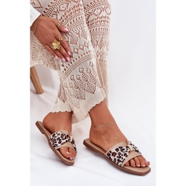 Chanclas de mujer plana con un beige de arco 7
