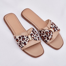 Chanclas de mujer plana con un beige de arco 10