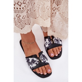 Chanclas de mujer plana con un arco negro 5
