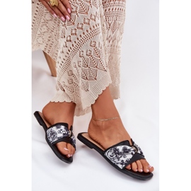 Chanclas de mujer plana con un arco negro 6