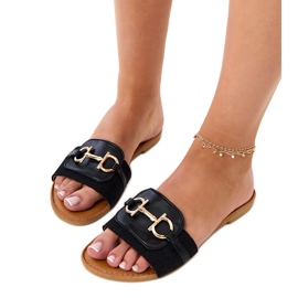 Chanclas negras con una decoración dorada en la barra negro 5