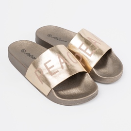 Shelvt Chanclas doradas planas con una inscripción dorado 3