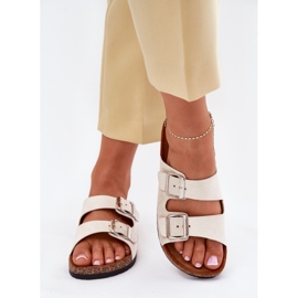 Zapatillas para mujeres en una plataforma de corcho con hebillas beige 3