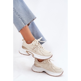 Zapatillas de deporte para mujeres en una suela beige masiva 6
