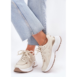 Zapatillas de deporte para mujeres en una suela beige masiva 5