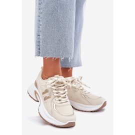 Zapatillas de deporte para mujeres en una suela beige masiva 1