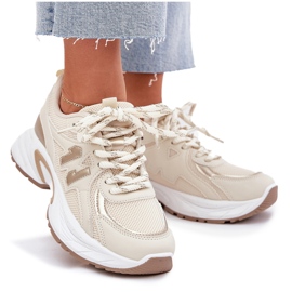 Zapatillas de deporte para mujeres en una suela beige masiva 10