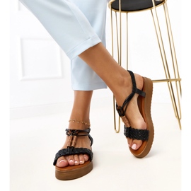 Sandalias negras con un cinturón de kerya trenzado negro 5
