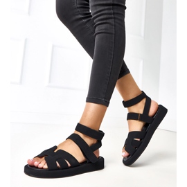 Sandalias negras sujetas con una maimuna de tobillo negro 2