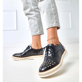 Zapatos de mujeres negras con pernos de gres negro 2