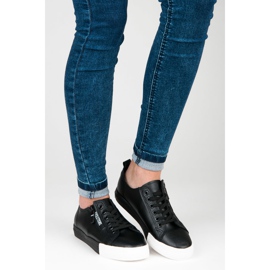 Zapatillas en la plataforma negro 5