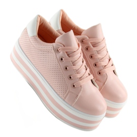 Zapatillas rosas rosas en una suela alta. rosado 5