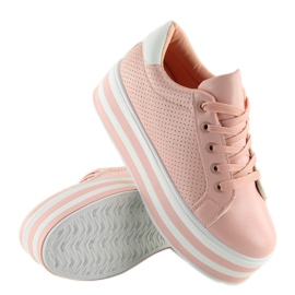 Zapatillas rosas rosas en una suela alta. rosado 4