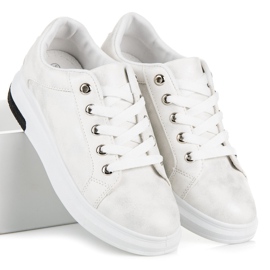 Deportivas blancas con estrella blanco 5