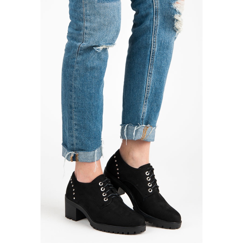 Seastar Zapatos negros en el puesto. 1